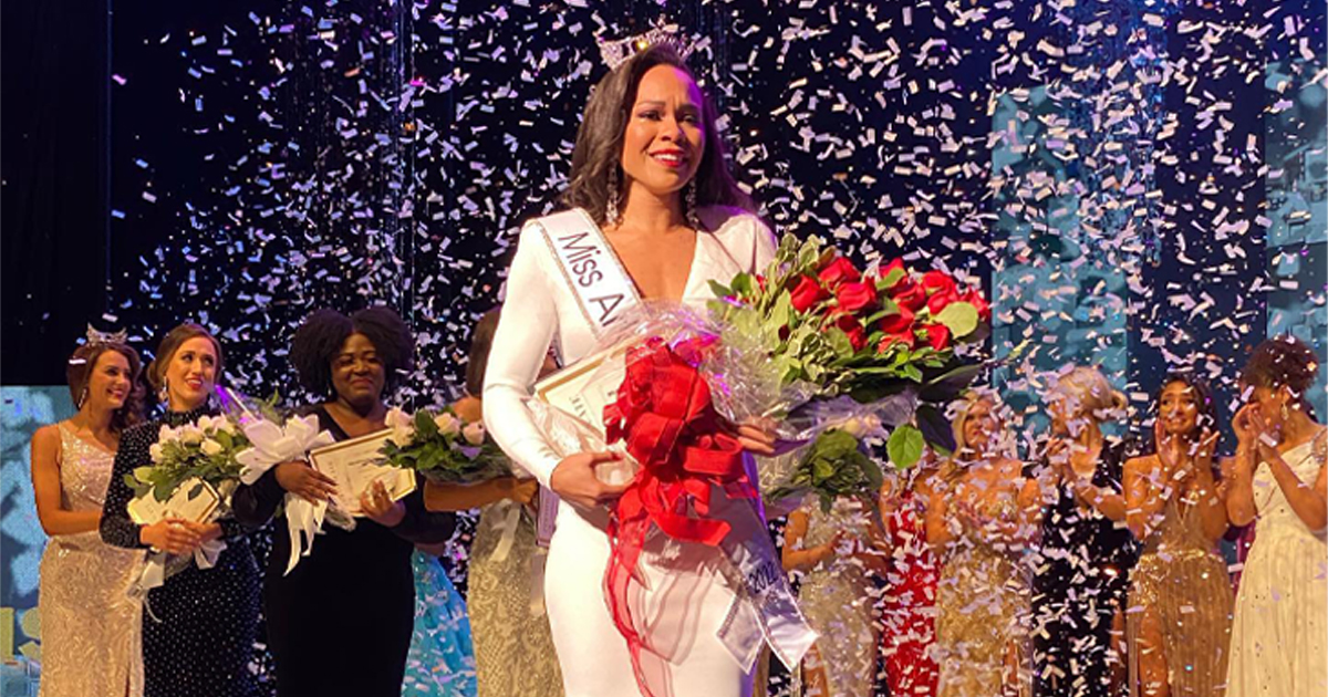 Ebony Mitchell onstage after being crowned Miss Arkansas
